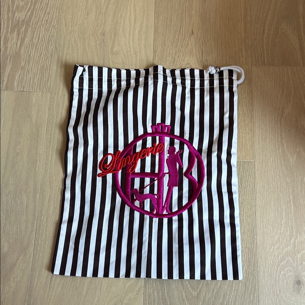 henri bendel signature White and Brown Striped Drawstring Lingerie Satchel